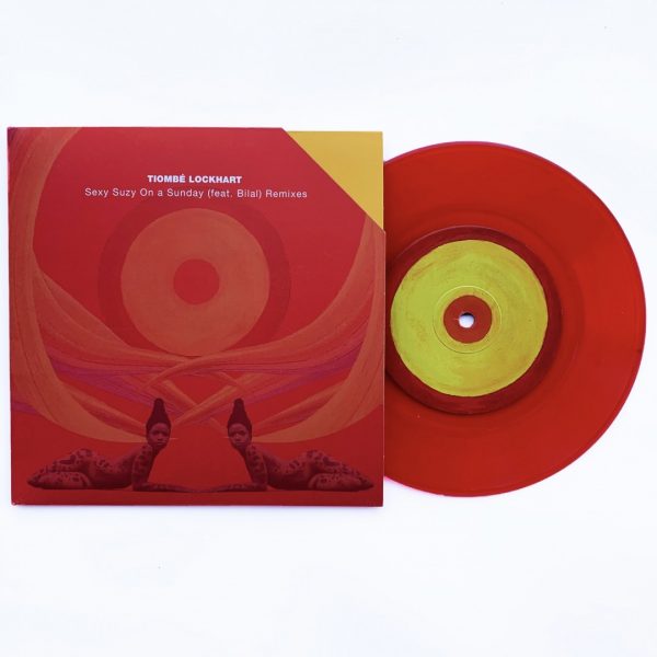 Side A of the 7" limited edition transparent red version of sexy suzy on a sunday by tiombé lockhart